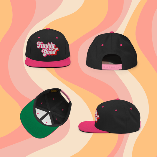 Funkin Good Snapback Hat featuring a structured fit, green undervisor, and vibrant pink accents on a stylish background.